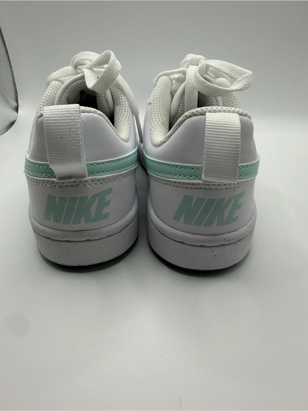 Nike Kids White Sneakers with Mint Green Swoosh